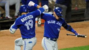 Bautista, Donaldson help Jays widen lead over O’s