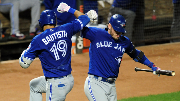Aug 29, 2016; Baltimore, MD, USA; Toronto Blue Jays outfielder Jose Bautista (19) is congratulated by third baseman Josh Donaldson (20) after hitting a home run in the sixth inning against the Baltimore Orioles at Oriole Park at Camden Yards. Photo Credit: Evan Habeeb-USA TODAY Sports
