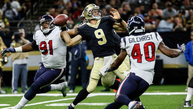 Aug 26, 2017; New Orleans, LA, USA; New Orleans Saints quarterback Drew Brees (9) throws as Houston Texans defensive tackle Carlos Watkins (91) and safety Marcus Gilchrist (40) pressure during the second quarter of a preseason game at the Mercedes-Benz Superdome. Photo Credit: Derick E. Hingle-USA TODAY Sports
