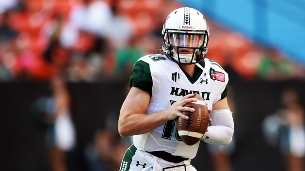 Dec 24, 2016; Honolulu, HI, USA; Hawaii Warriors quarterback Dru Brown (19) looks to make a pass against the Middle Tennessee Blue Raiders during the second quarter at Hawaiian Tel Federal Credit Union Field. Photo Credit: Marco Garcia-USA TODAY Sports