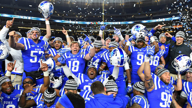Dec 26, 2015; Bronx, NY, USA; The Duke Blue Devils players celebrate after defeating the Indiana Hoosiers 44-41 in overtime during the 2015 New Era Pinstripe Bowl at Yankee Stadium. Mandatory Credit: Rich Barnes-USA TODAY Sports