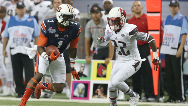 Sep 5, 2015; Atlanta, GA, USA; Auburn Tigers wide receiver D'haquille Williams (1) runs with the ball chased by Louisville Cardinals safety Chucky Williams (22) during the second quarter in the 2015 Chick-fil-A Kickoff Game at the Georgia Dome. Mandatory Credit: Jason Getz-USA TODAY Sports