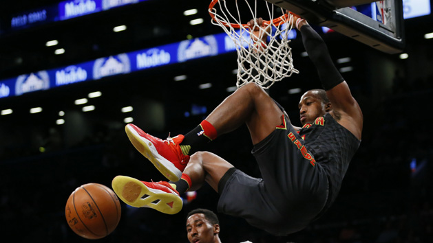 Jan 10, 2017; Brooklyn, NY, USA; Atlanta Hawks center Dwight Howard (8) dunks the ball over Brooklyn Nets forward Rondae Hollis-Jefferson (24) during second half at Barclays Center. The Hawks won 117-97. Photo Credit: Noah K. Murray-USA TODAY Sports