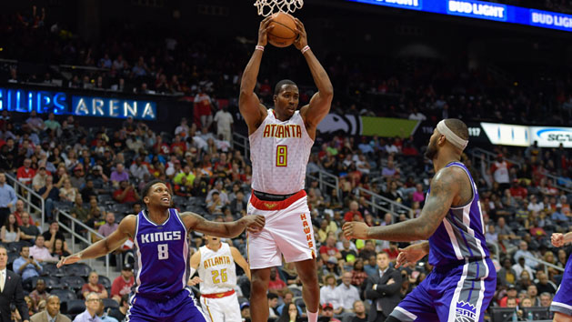 Oct 31, 2016; Atlanta, GA, USA; Atlanta Hawks center Dwight Howard (8) controls a rebound between Sacramento Kings forward Rudy Gay (8) and center DeMarcus Cousins (15) during the second half at Philips Arena. The Hawks defeated the Kings 106-95. Photo Credit: Dale Zanine-USA TODAY Sports
