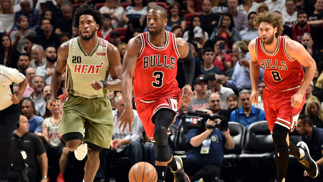 Nov 10, 2016; Miami, FL, USA; Chicago Bulls guard Dwyane Wade (3) dribbles the ball past Miami Heat forward Justise Winslow (20) during the first half at American Airlines Arena. Photo Credit: Steve Mitchell-USA TODAY Sports