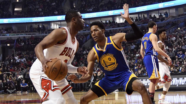Mar 2, 2017; Chicago, IL, USA; Chicago Bulls guard Dwyane Wade (3) is defended by Golden State Warriors guard Patrick McCaw (0) during the first quarter at the United Center. Photo Credit: David Banks-USA TODAY Sports