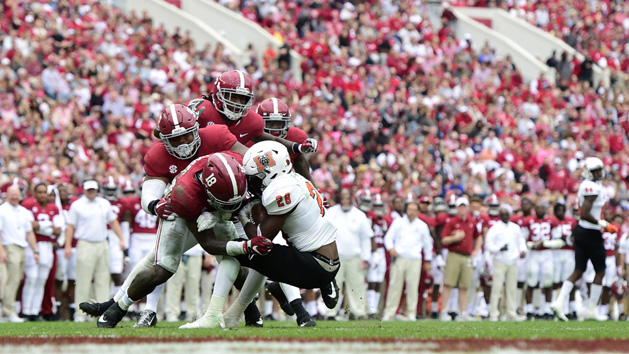 Nov 18, 2017; Tuscaloosa, AL, USA; Mercer Bears running back Tee Mitchell (28) is tackled by Alabama Crimson Tide linebacker Dylan Moses (18) during the third quarter at Bryant-Denny Stadium. Photo Credit: Adam Hagy-USA TODAY Sports