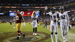 Eagles rout Redskins and earn playoff berth