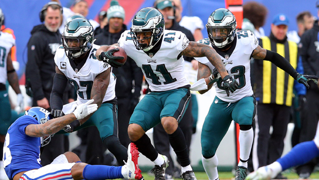 Dec 17, 2017; East Rutherford, NJ, USA; Philadelphia Eagles corner back Ronald Darby (41) runs back an interception against New York Giants wide receiver Roger Lewis (18) during the second quarter at MetLife Stadium. Photo USA TODAY Sports