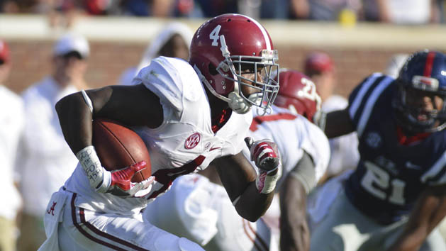 Sep 17, 2016; Oxford, MS, USA; Alabama Crimson Tide defensive back Eddie Jackson (4) returns a kick during the third quarter of the game against the Mississippi Rebels at Vaught-Hemingway Stadium. Alabama won 48-43. Photo Credit: Matt Bush-USA TODAY Sports