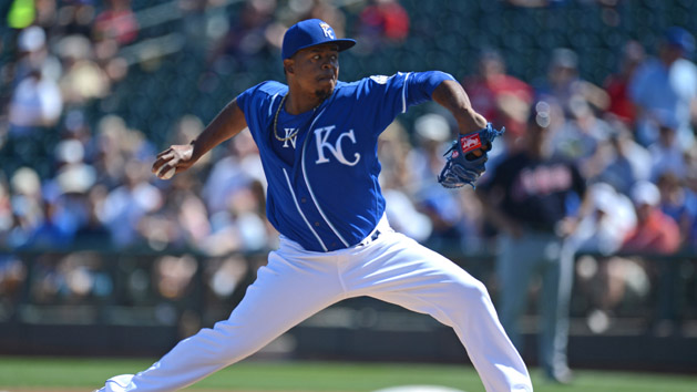 Mar 13, 2016; Surprise, AZ, USA; Kansas City Royals starting pitcher Edinson Volquez (36) pitches during the first inning against the Cleveland Indians at Surprise Stadium. Mandatory Credit: Joe Camporeale-USA TODAY Sports