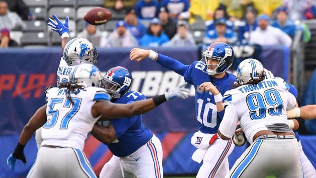 Dec 18, 2016; East Rutherford, NJ, USA; New York Giants quarterback Eli Manning (10) throws the ball during the first quarter against the Lions at MetLife Stadium. Photo Credit: Robert Deutsch-USA TODAY Sports