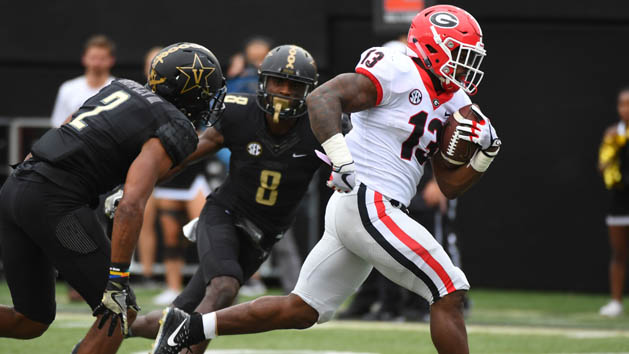 Oct 7, 2017; Nashville, TN, USA; Georgia Bulldogs running back Elijah Holyfield (13) runs for a touchdown during the second half against the Vanderbilt Commodores at Vanderbilt Stadium. Photo Credit: Christopher Hanewinckel-USA TODAY Sports