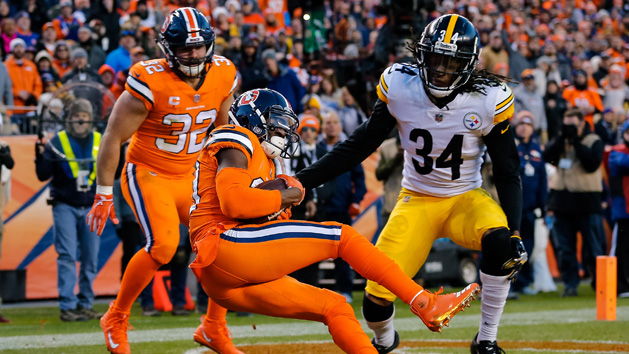 Nov 25, 2018; Denver, CO, USA; Denver Broncos wide receiver Emmanuel Sanders (10) makes a touchdown catch ahead of Pittsburgh Steelers strong safety Terrell Edmunds (34) as fullback Andy Janovich (32) defends in the third quarter at Broncos Stadium at Mile High. Photo Credit: Isaiah J. Downing-USA TODAY Sports