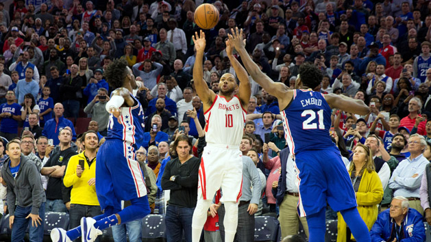 Oct 25, 2017; Philadelphia, PA, USA; Houston Rockets guard Eric Gordon (10) hits a game winning three pointer past Philadelphia 76ers center Joel Embiid (21) and forward Robert Covington (33) as guard James Harden (13) looks on at Wells Fargo Center. Photo Credit: Bill Streicher-USA TODAY Sports