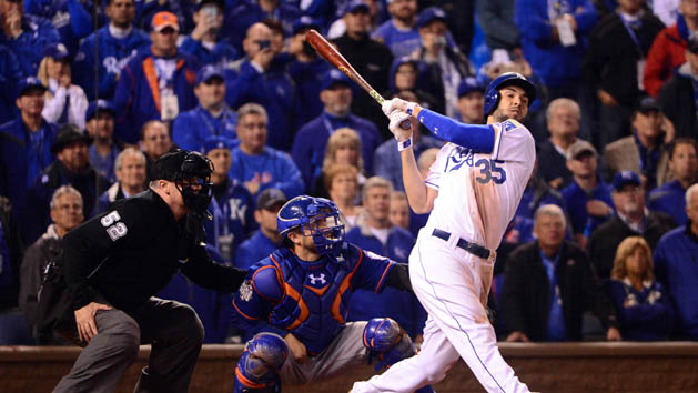 Oct 27, 2015; Kansas City, MO, USA; Kansas City Royals first baseman Eric Hosmer (35) drives in the winning run with a sacrifice fly against the New York Mets in the 14th inning in game one of the 2015 World Series at Kauffman Stadium. Mandatory Credit: Jeff Curry-USA TODAY Sports