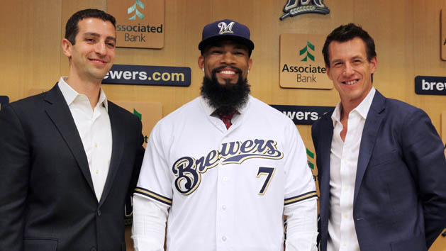 Nov 29, 2016; Milwaukee, WS, USA; Eric Thames is introduced as a Milwaukee Brewer by general manager David Stearns (left) and coach Craig Counsel (right) during a press conference in Milwaukee. Photo Credit: Rick Wood/Milwaukee Journal Sentinel via USA TODAY NETWORK