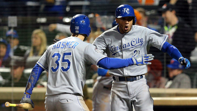 Nov 1, 2015; New York City, NY, USA; Kansas City Royals shortstop Alcides Escobar (2) celebrates with first baseman Eric Hosmer (35) after scoring a run against the New York Mets in the 12th inning in game five of the World Series at Citi Field. Mandatory Credit: Brad Penner-USA TODAY Sports