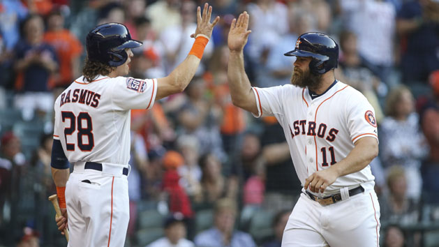 May 2, 2015; Houston, TX, USA; Houston Astros left fielder Colby Rasmus (28) congratulates designated hitter Evan Gattis (11) after Gattis hits a home run during the third inning against the Seattle Mariners at Minute Maid Park. Mandatory Credit: Troy Taormina-USA TODAY Sports