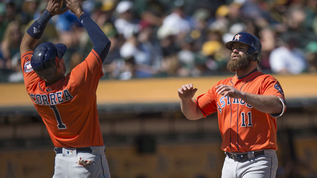 Sep 21, 2016; Oakland, CA, USA; Houston Astros designated hitter Evan Gattis (11) celebrates his two-run home run with Astros shortstop Carlos Correa (1) during the sixth inning against the Oakland Athletics at Oakland Coliseum. Photo Credit: Kenny Karst-USA TODAY Sports