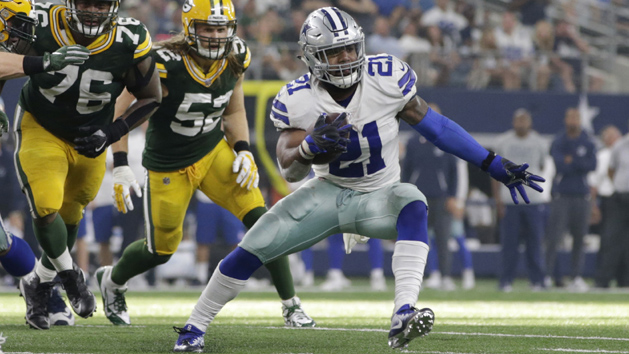 Oct 8, 2017; Arlington, TX, USA; Dallas Cowboys running back Ezekiel Elliott (21) runs againsGreen Bay Packers cornerback Quinten Rollins (24) in the fourth quarter at AT&T Stadium. Photo Credit: Tim Heitman-USA TODAY Sports