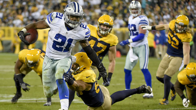 Oct 16, 2016; Green Bay, WI, USA; Dallas Cowboys running back Ezekiel Elliott (21) carries the ball as Green Bay Packers linebacker Nick Perry (53) tackles in the fourth quarter at Lambeau Field. Photo Credit: Benny Sieu-USA TODAY Sports