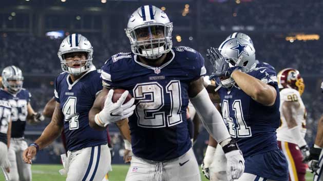 Nov 24, 2016; Arlington, TX, USA; Dallas Cowboys running back Ezekiel Elliott (21) scores a touchdown against the Washington Redskins during the second half at AT&T Stadium. The Cowboys defeat the Redskins 31-26. Photo Credit: Jerome Miron-USA TODAY Sports