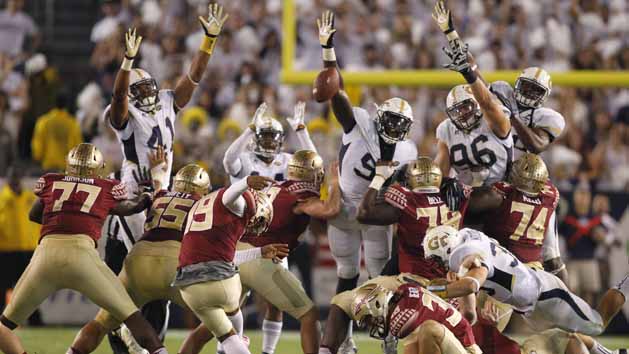 Oct 24, 2015; Atlanta, GA, USA; Georgia Tech Yellow Jackets defensive lineman Patrick Gamble (91) blocks the kick of Florida State Seminoles place kicker Roberto Aguayo (19) in the fourth quarter at Bobby Dodd Stadium. Georgia Tech defeated Florida State 22-16. Mandatory Credit: Brett Davis-USA TODAY Sports
