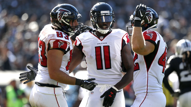 Sep 18, 2016; Oakland, CA, USA; Atlanta Falcons tight end Jacob Tamme (83) is congratulated by wide receiver Julio Jones (11) after catching a touchdown against the Oakland Raiders in the third quarter at Oakland-Alameda County Coliseum. The Falcons defeated the Raiders 35-28. Photo Credit: Cary Edmondson-USA TODAY Sports
