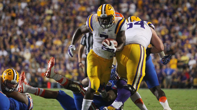 Oct 17, 2015; Baton Rouge, LA, USA; LSU Tigers running back Leonard Fournette (7) carries the ball against the Florida Gators during the second quarter at Tiger Stadium. Mandatory Credit: Crystal LoGiudice-USA TODAY Sports