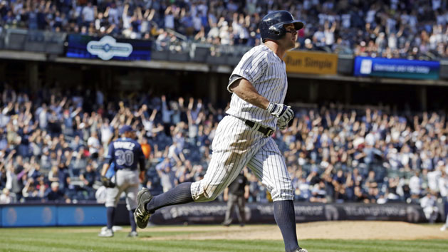 Apr 23, 2016; Bronx, NY, USA; New York Yankees left fielder Brett Gardner (11) runs up the first baseline after hitting a walk off solo home run off of Tampa Bay Rays starting pitcher Erasmo Ramirez (30) during the ninth inning at Yankee Stadium. The Yankees defeated the Rays 3-2. Mandatory Credit: Adam Hunger-USA TODAY Sports