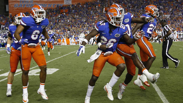 Sep 17, 2016; Gainesville, FL, USA; Florida Gators defensive back Marcell Harris (26) is congratulated after he intercepted the ball against the North Texas Mean Green during the second quarter at Ben Hill Griffin Stadium. Photo Credit: Kim Klement-USA TODAY Sports