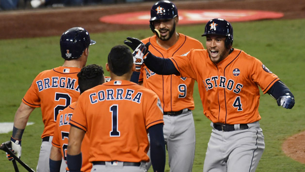 Nov 1, 2017; Los Angeles, CA, USA; Houston Astros center fielder George Springer (4) celebrates with left fielder Marwin Gonzalez (9) and third baseman Alex Bregman (2) and shortstop Carlos Correa (1) after scoring on his two run home run against the Los Angeles Dodgers in the second inning in game seven of the 2017 World Series at Dodger Stadium. Photo Credit: Richard Mackson-USA TODAY Sports