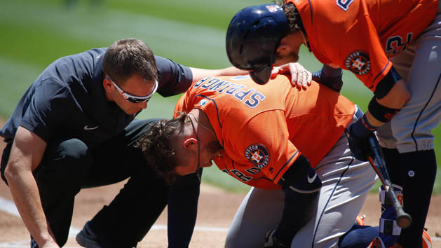 Jun 22, 2017; Oakland, CA, USA; Houston Astros center fielder George Springer (4) lays on the field after getting hit by a pitch from Oakland Athletics starting pitcher Jesse Hahn (not pictured) as he is checked by medical staff during the first inning at Oakland Coliseum. Photo Credit: Stan Szeto-USA TODAY Sports