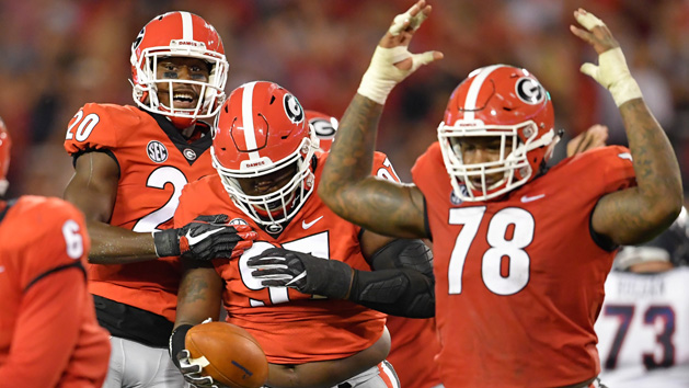 Sep 16, 2017; Athens, GA, USA; Georgia Bulldogs nose tackle John Atkins (97) reacts with defensive back J.R. Reed (20) and defensive tackle Trenton Thompson (78) after recovering a fumble against the Samford Bulldogs during the second half at Sanford Stadium. Photo Credit: Dale Zanine-USA TODAY Sports