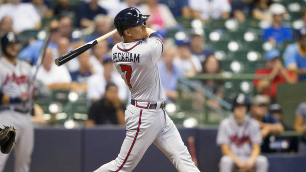 Aug 8, 2016; Milwaukee, WI, USA; Atlanta Braves second baseman Gordon Beckham (7) hits a sacrifice fly during the twelfth inning against the Milwaukee Brewers at Miller Park. Photo Credit: Jeff Hanisch-USA TODAY Sports