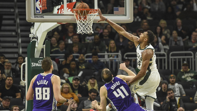 Nov 4, 2018; Milwaukee, WI, USA; Milwaukee Bucks forward Giannis Antetokounmpo (34) dunks against Sacramento Kings center Kosta Koufos (41) in the third quarter at the Fiserv Forum. Photo Credit: Benny Sieu-USA TODAY Sports