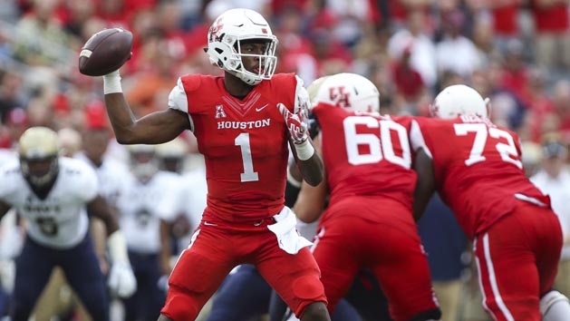 Nov 27, 2015; Houston, TX, USA; Houston Cougars quarterback Greg Ward Jr. (1) attempts a pass during the fourth quarter against the Navy Midshipmen at TDECU Stadium. The Cougars defeated the Midshipmen 52-31. Photo Credit: Troy Taormina-USA TODAY Sports