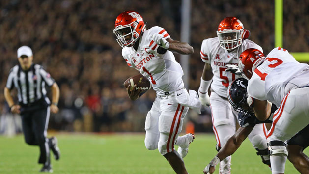 Sep 15, 2016; Cincinnati, OH, USA; Houston Cougars quarterback Greg Ward Jr. (1) carries the ball for a touchdown against the Cincinnati Bearcats in the second half at Nippert Stadium. Houston won 40-16. Photo Credit: Aaron Doster-USA TODAY Sports