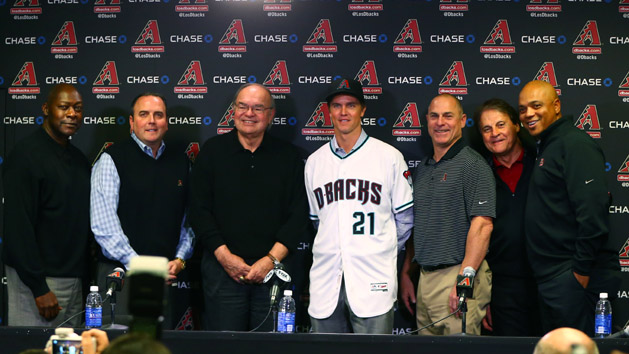 Dec 11, 2015; Phoenix, AZ, USA; (From left) general manager Dave Stewart , team president Derrick Hall , managing general partner Ken Kendrick , Arizona Diamondbacks pitcher Zack Greinke , manager Chip Hale , chief baseball officer Tony La Russa and senior vice president of baseball operations De Jon Watson pose for a group photo during a press conference at Chase Field . Mandatory Credit: Mark J. Rebilas-USA TODAY Sports
