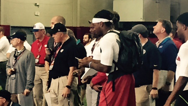 Derrick Henry watches as a teammate participates in a drill at Alabama's Pro Day. (Matt Lowe)