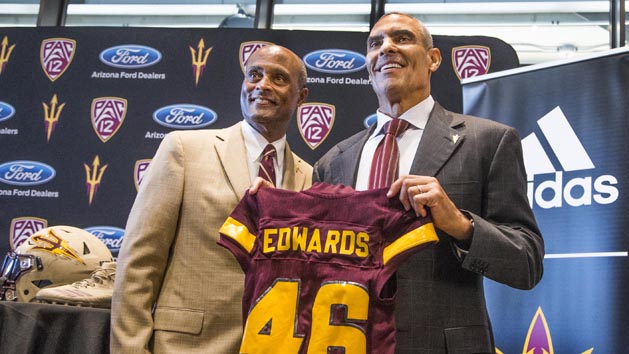 Dec 4, 2017; Tempe, AZ, USA; Arizona State Sun Devils vice president of athletics Ray Anderson, left, introduces the new head football coach Herman Edwards at Sun Devil Stadium. Photo Credit: Tom Tingle/The Arizona Republic via USA TODAY Sports
