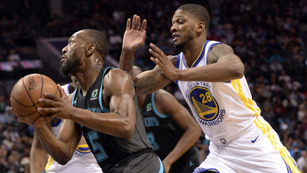 Feb 25, 2019; Charlotte, NC, USA; Charlotte Hornets guard Kemba Walker (15) drives past Golden State Warriors forward Alfonzo McKinnie (28) during the second half at the Spectrum Center. Warriors won 121-110. Photo Credit: Sam Sharpe-USA TODAY Sports