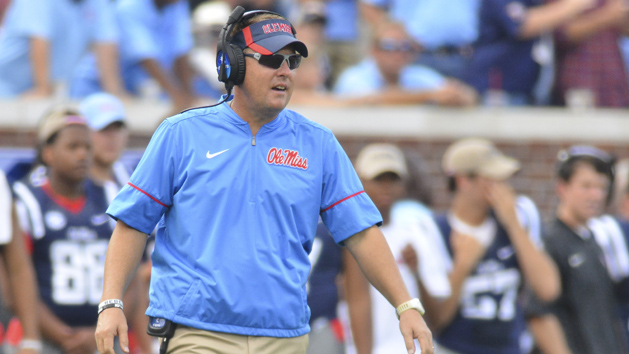 Sep 17, 2016; Oxford, MS, USA; Mississippi Rebels head coach Hugh Freeze walks onto the field to check on an injured player during the first quarter of the game against the Alabama Crimson Tide at Vaught-Hemingway Stadium. Photo Credit: Matt Bush-USA TODAY Sports