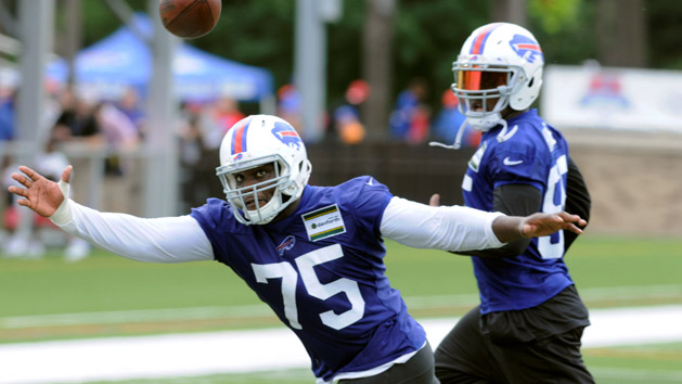 Jul 30, 2016; Pittsford, NY, USA; Buffalo Bills defensive end IK Enemkpali (75) defends a pass during the first session of training camp at St. John Fisher College. Photo Credit: Mark Konezny-USA TODAY Sports
