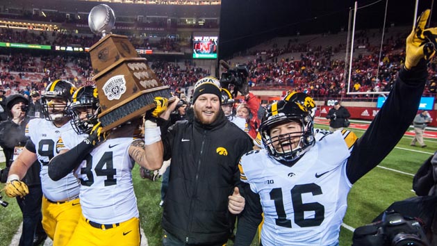 Nov 27, 2015; Lincoln, NE, USA; The Iowa Hawkeyes celebrate their victory over the Nebraska Cornhuskers at Memorial Stadium. Iowa won 28-20. Mandatory Credit: Jeffrey Becker-USA TODAY Sports