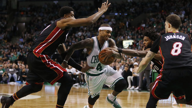 Dec 30, 2016; Boston, MA, USA; Boston Celtics guard Isaiah Thomas (4) tries to get through Miami Heat center Hassan Whiteside (21), Miami Heat forward Justise Winslow (20) and Miami Heat guard Tyler Johnson (8) during the second half at TD Garden. Mandatory Credit: Winslow Townson-USA TODAY Sports
