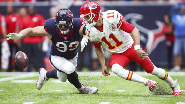 Sep 18, 2016; Houston, TX, USA; Houston Texans defensive end J.J. Watt (99) and Kansas City Chiefs quarterback Alex Smith (11) attempt to recover a fumble during the first quarter at NRG Stadium. Photo Credit: Troy Taormina-USA TODAY Sports