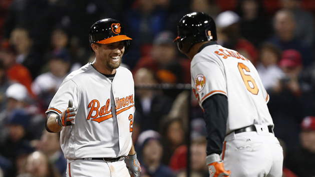Apr 12, 2016; Boston, MA, USA; Baltimore Orioles shortstop J.J. Hardy (2) celebrates his home run against the Boston Red Sox with second baseman Jonathan Schoop (6) during the seventh inning at Fenway Park. Mandatory Credit: Mark L. Baer-USA TODAY Sports