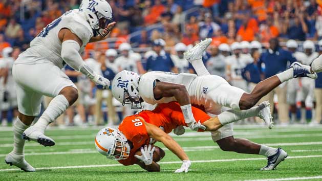 Oct 21, 2017; San Antonio, TX, USA; Rice Owls safety J.T. Ibe (17) brings down UTSA Roadrunners wide receiver Brady Jones (86) during the first quarter at Alamodome. Photo Credit: John Gutierrez-USA TODAY Sports